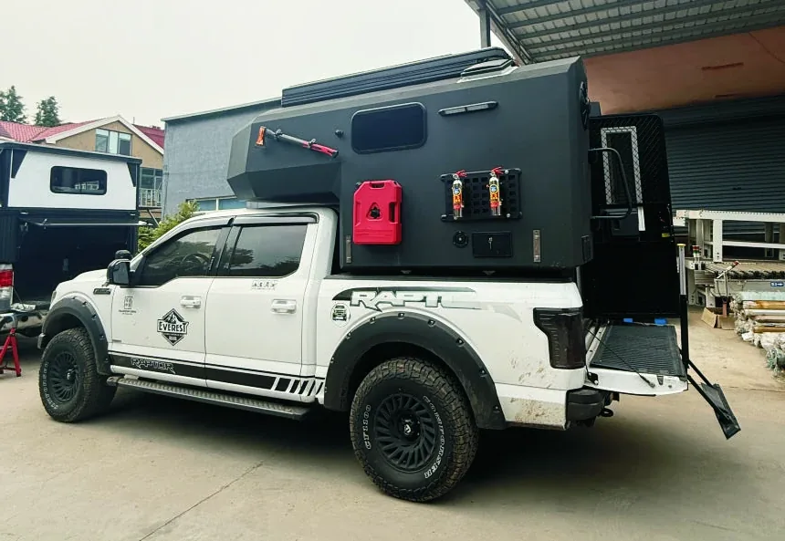 TUYU H2 aluminium hard-top camper with an angular welded body fitted to a white pickup